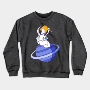 The Astronaut collection reading on the planet Crewneck Sweatshirt